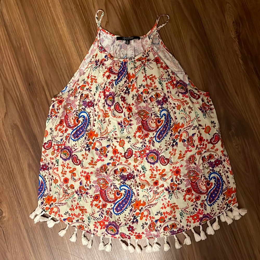 Cute summer top with fringe at the bottom!